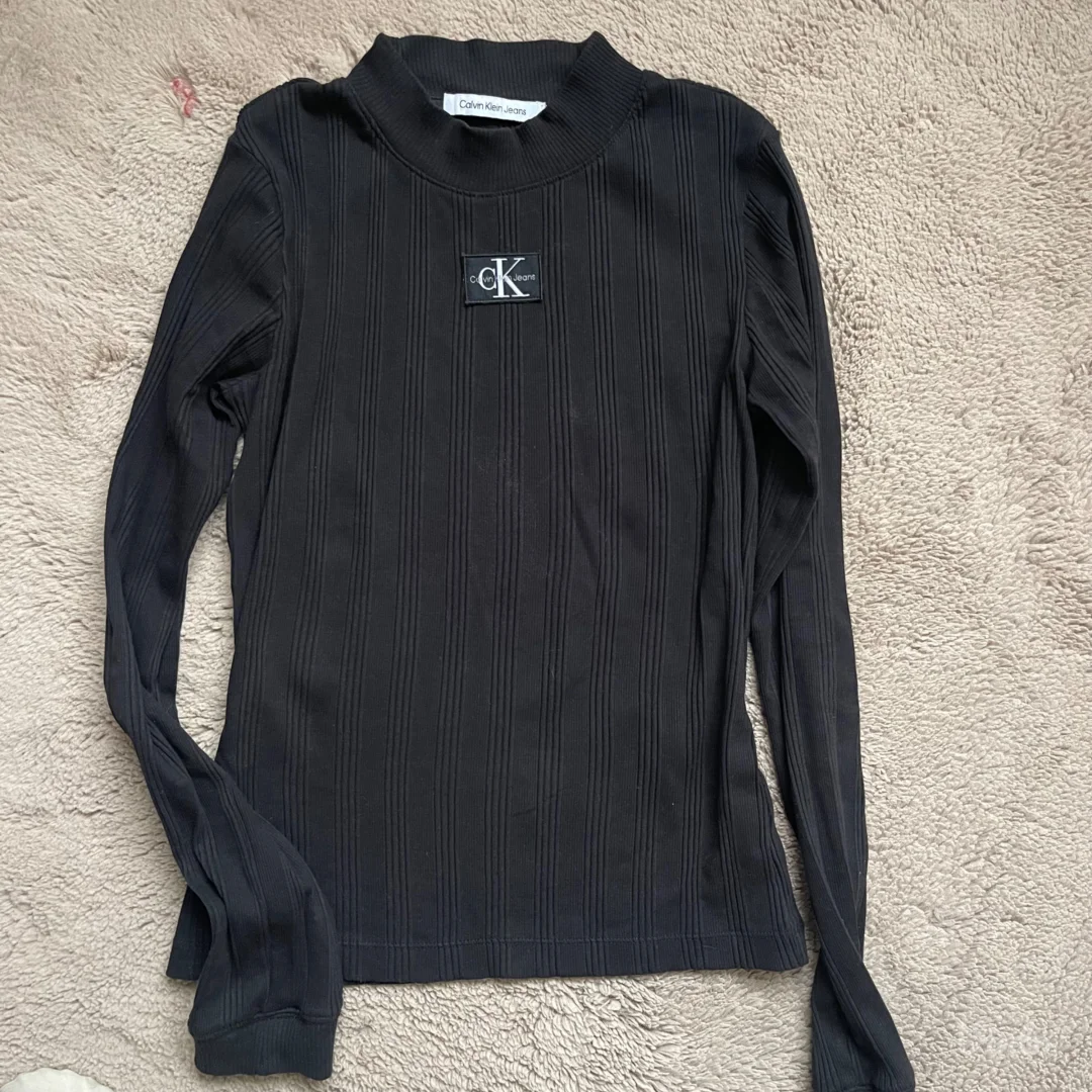 Calvin Klein polurolka