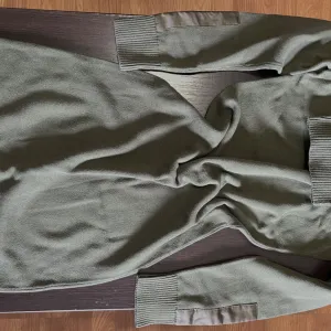 Calvin Klein Maslinasto zelena haljina-rolka