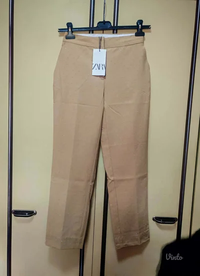 Zara pantalone sa cirkonima s - m