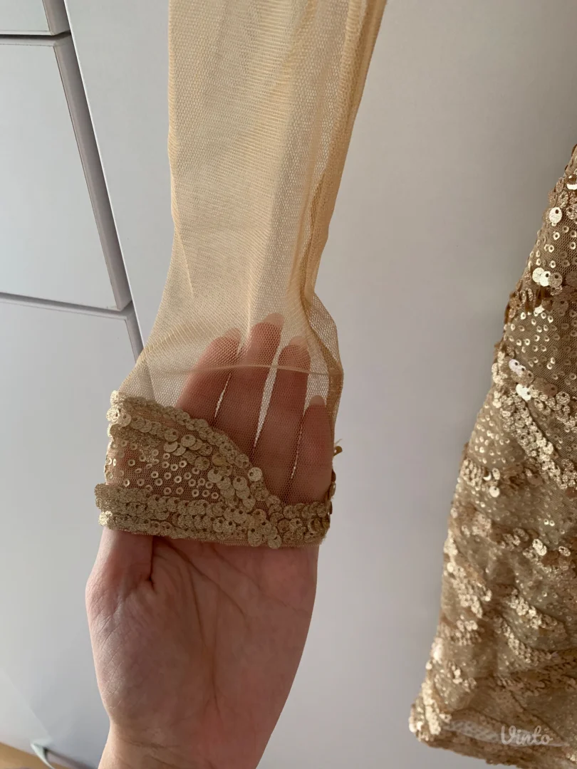 Šljokičava kratka haljina