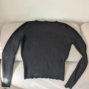 Lindex crni ženski džemper