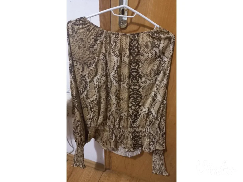 Za ljubitelje animal printa bluza H&M