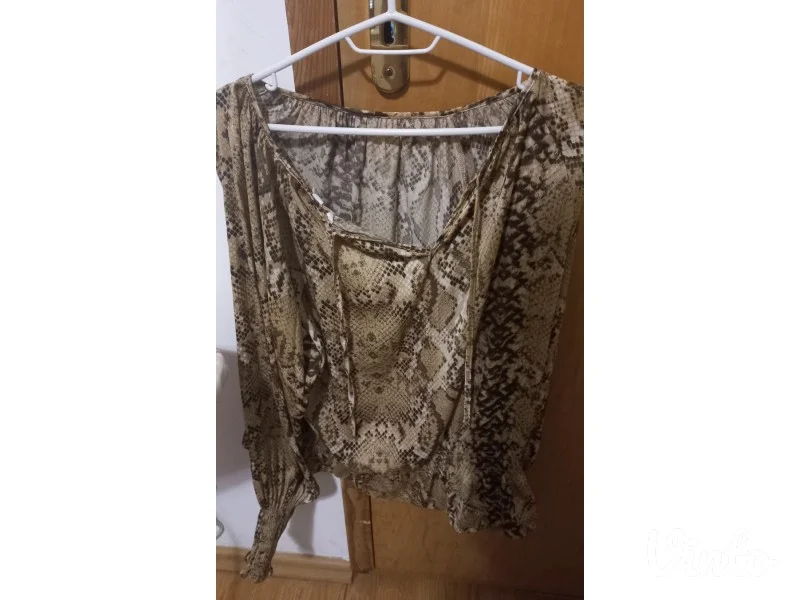Za ljubitelje animal printa bluza H&M