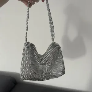 Temu - ženska torbica sa šljokicama