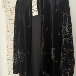 Zara plisani kaftan, nov