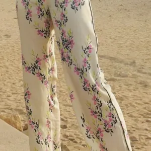 Zara satenske cvetne pantalone