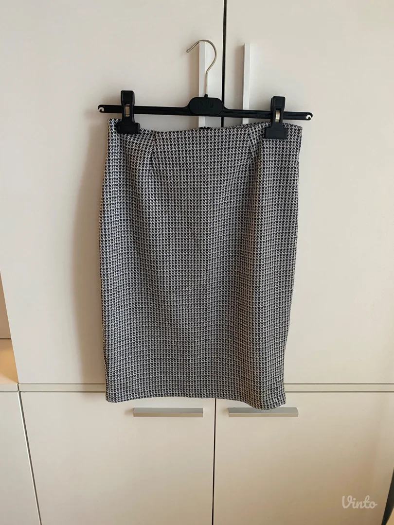 Reserved pencil suknja