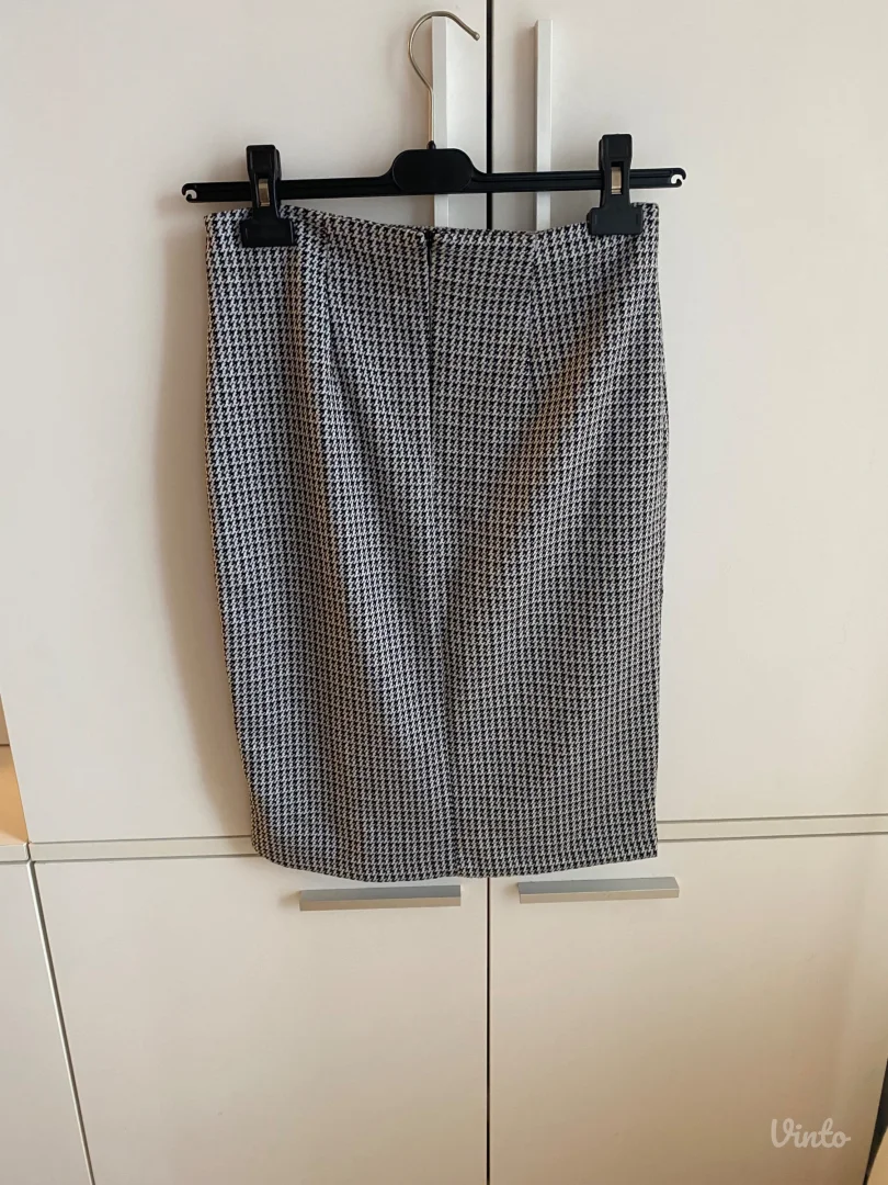 Reserved pencil suknja