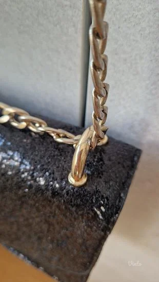 Stradivarius torbica sa šljokicama