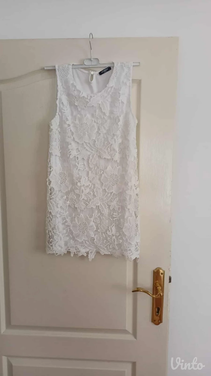 dvoslojna čipka predivna tunika bele boje L/XL