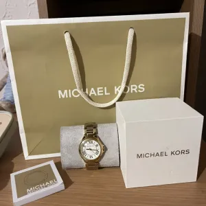 Michael Kors original zlatni sat