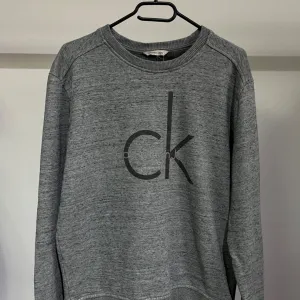 Calvin Klein muški duks M/L vel.