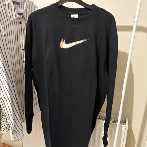 Nike-tunika haljina