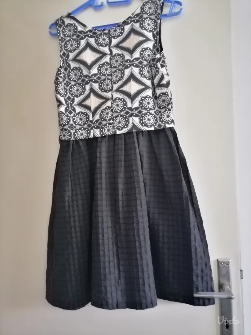 Nova elegantna haljinica