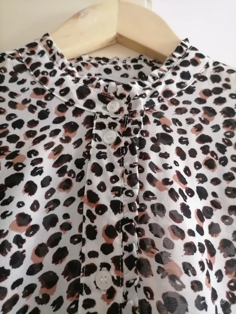 Tigrasta bluza-košulja H&M  38