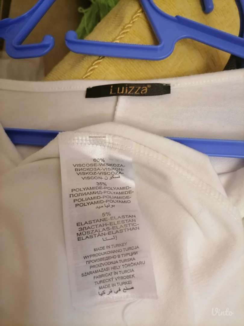 Bela asimetrična duža bluza