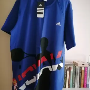 Adidas pamučna majica Novak nova sa etiketom  L