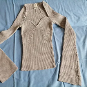 Nova srebrnasta trikotažna bluza H&M M