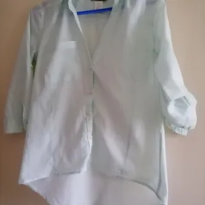 Tanka svetlo zelena košuljica Bershka M