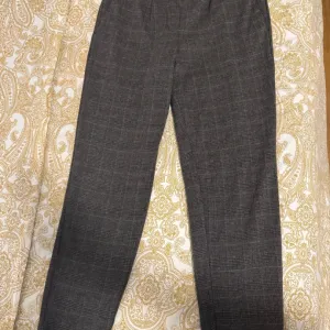 Tom Tailor mekane pantalone