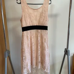 Cipkana roze haljina