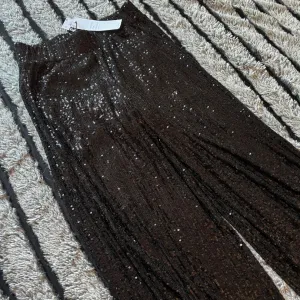 Pantalone sa šljokicama XS nove!