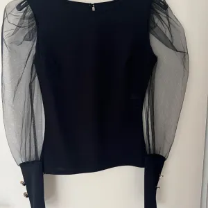 Butik iz Kg-bluza sa rukavima od organze