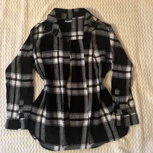 Karirana deblja kosulja