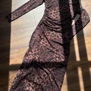 Prestiz tigrasta haljina