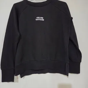 Crni ženski džemper