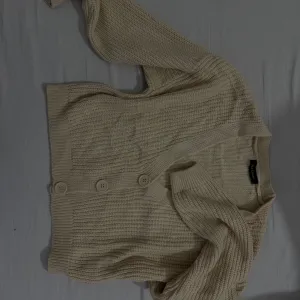 Bež kardigan sa dugmadima( LcWaikiki)