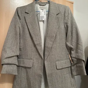 H&M sivi ženski sako