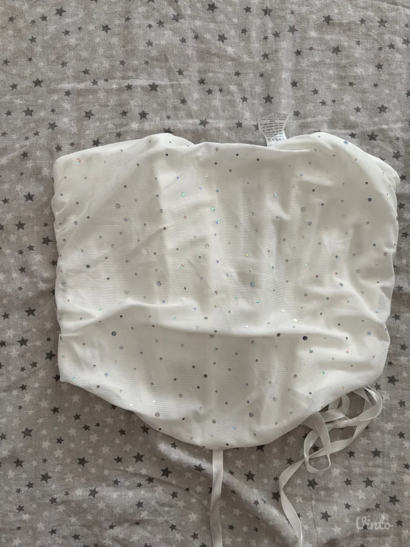 Beli korset s cirkonima