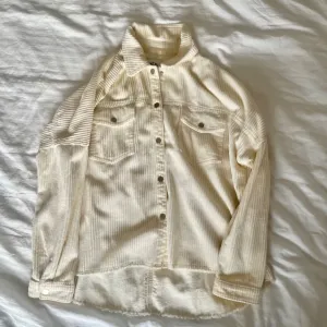 zara bela kosulja jakna