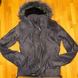 SuperDry - Zimska jakna protiv vetra XS