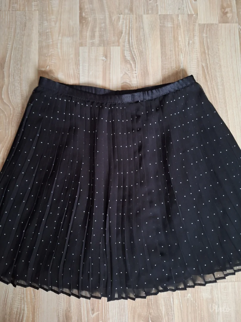 Uniqlo tufnasta plisirana suknja