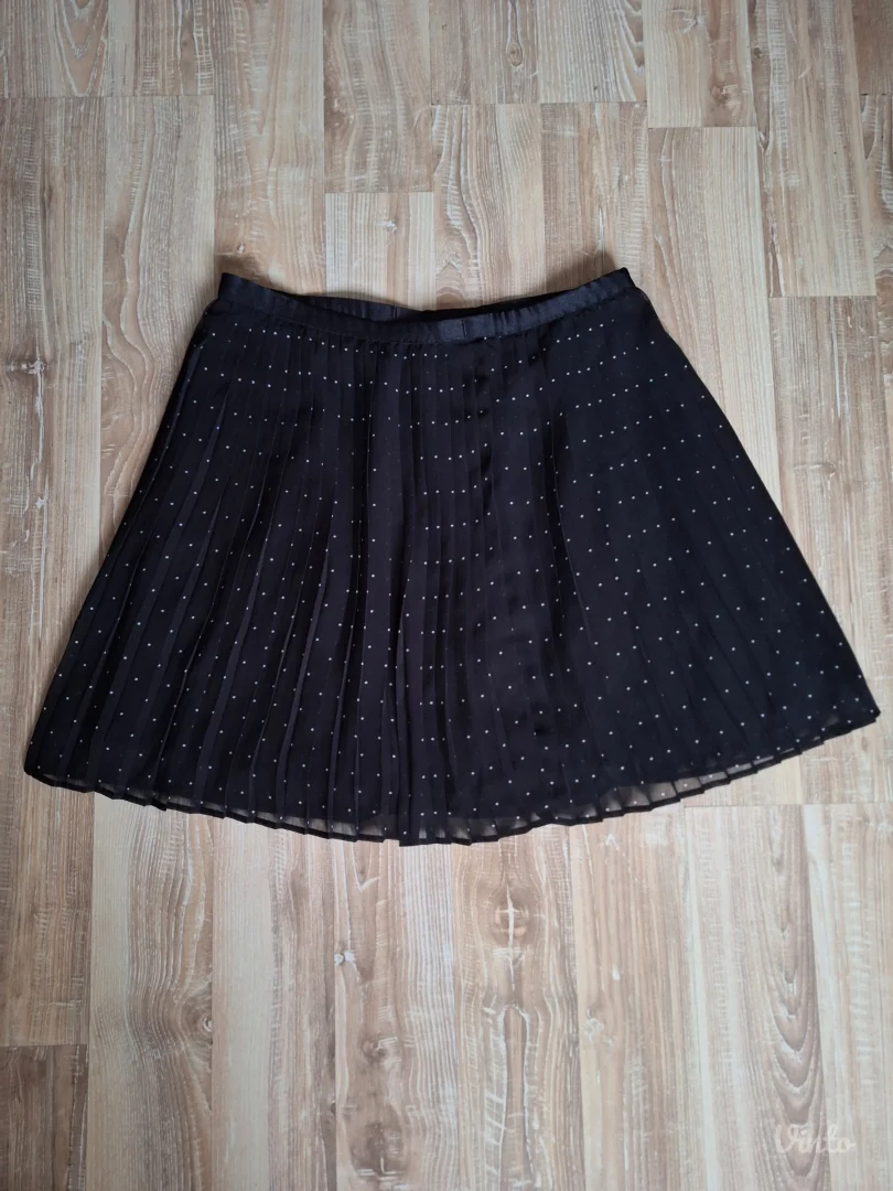 Uniqlo tufnasta plisirana suknja