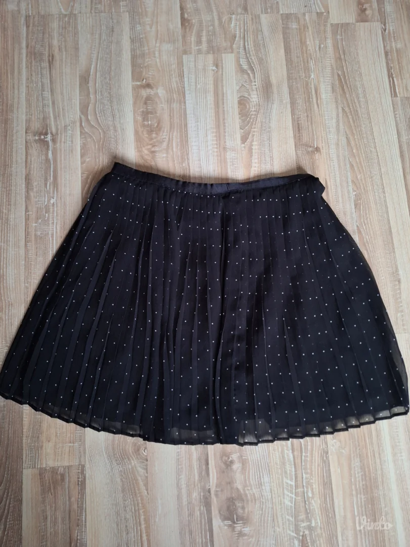 Uniqlo tufnasta plisirana suknja