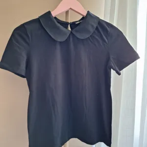 Zara majica sa kragnom