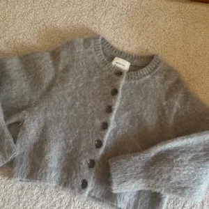 H&M dzemper premium kolekcija