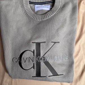 Original Calvin Klein Jeans muški džemper sa vezom XL