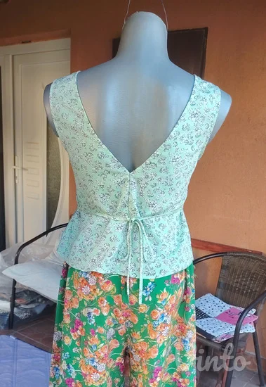 Primark cvetna peplum bluza sa mašnom S