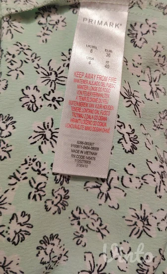 Primark cvetna peplum bluza sa mašnom S