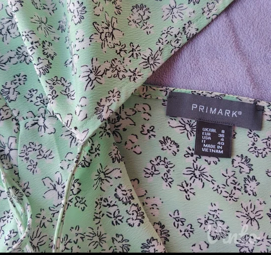 Primark cvetna peplum bluza sa mašnom S