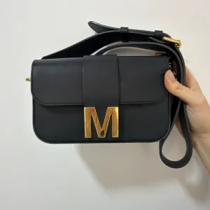 Mona kozna torba sa zlatnom snalom