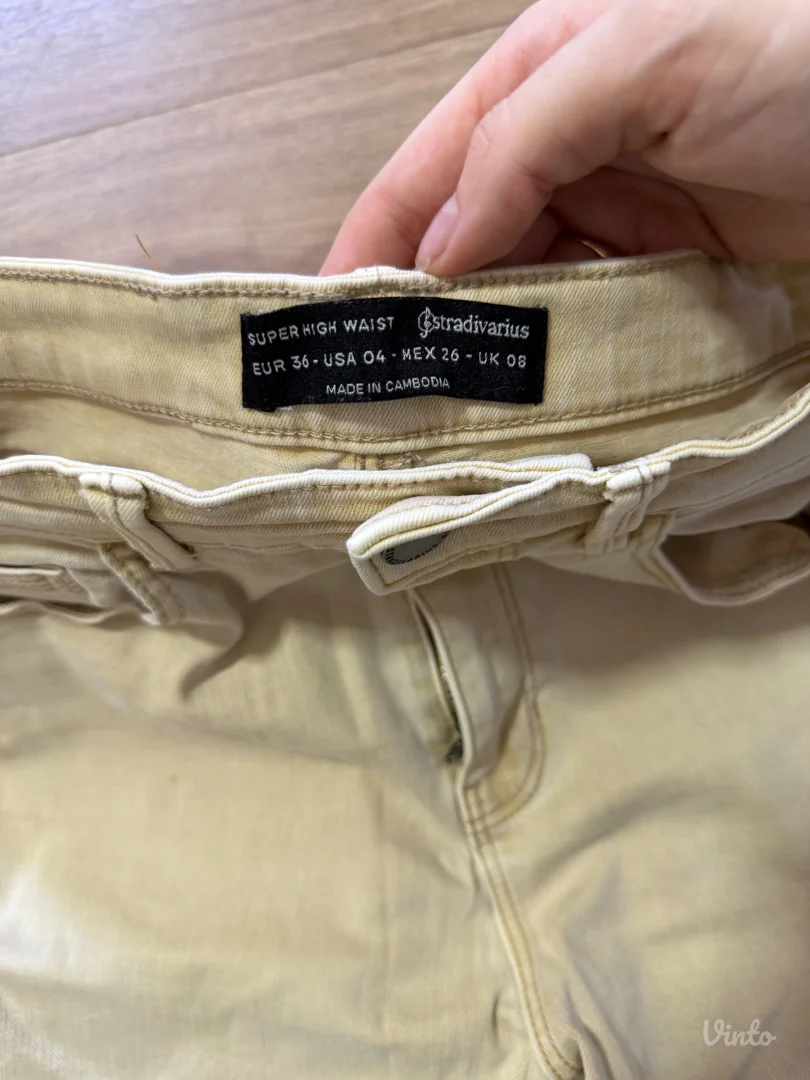 Stradivarius krem farmerke sa dzepovima 36