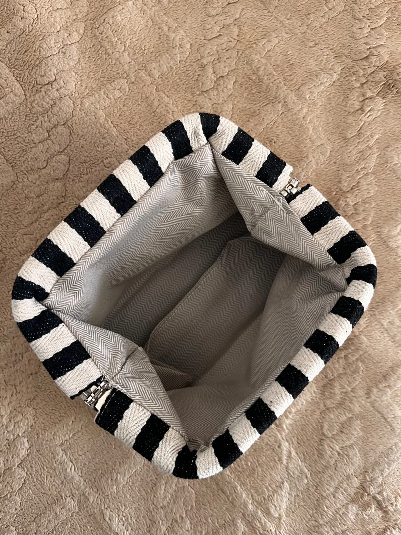 Pletena clutch torbica