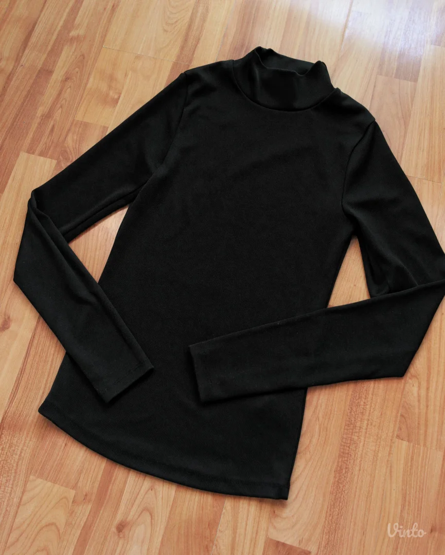 Kvalitetna vintage crna rolka za sve prilike