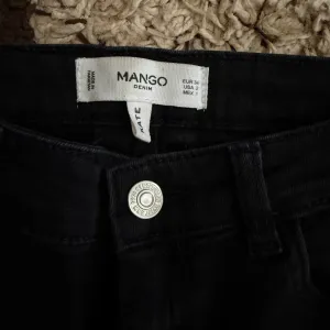 Mango crne farmerice