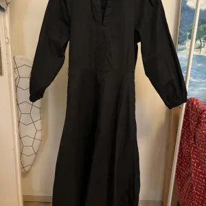 Crna haljina-košulja